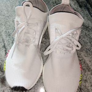 Adidas nmd's grey color. Size 7.5 men and 9 in women. Excellent condition